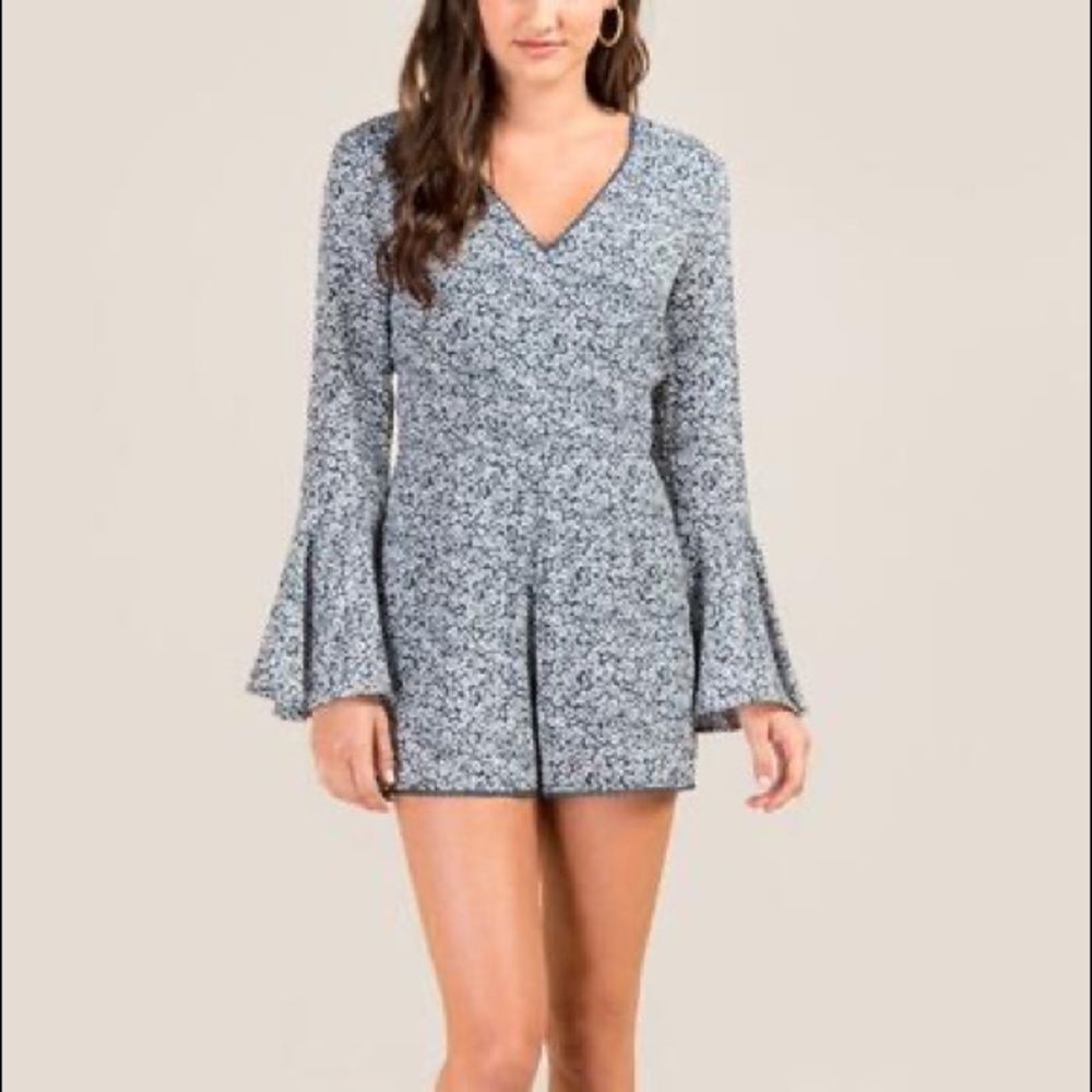Francesca’s Maggie Bell Sleeve Floral Romper